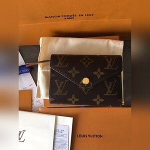 Louis Vuitton Victorine Wallet Fuchsia